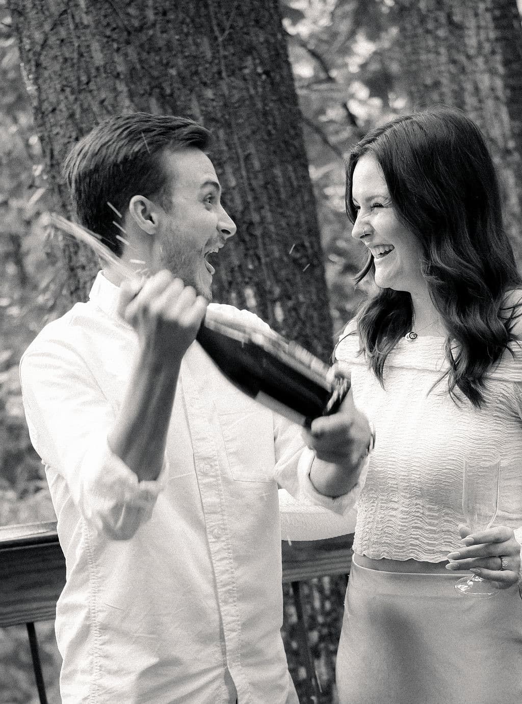 Black and white: Chandler with the champagne bottle