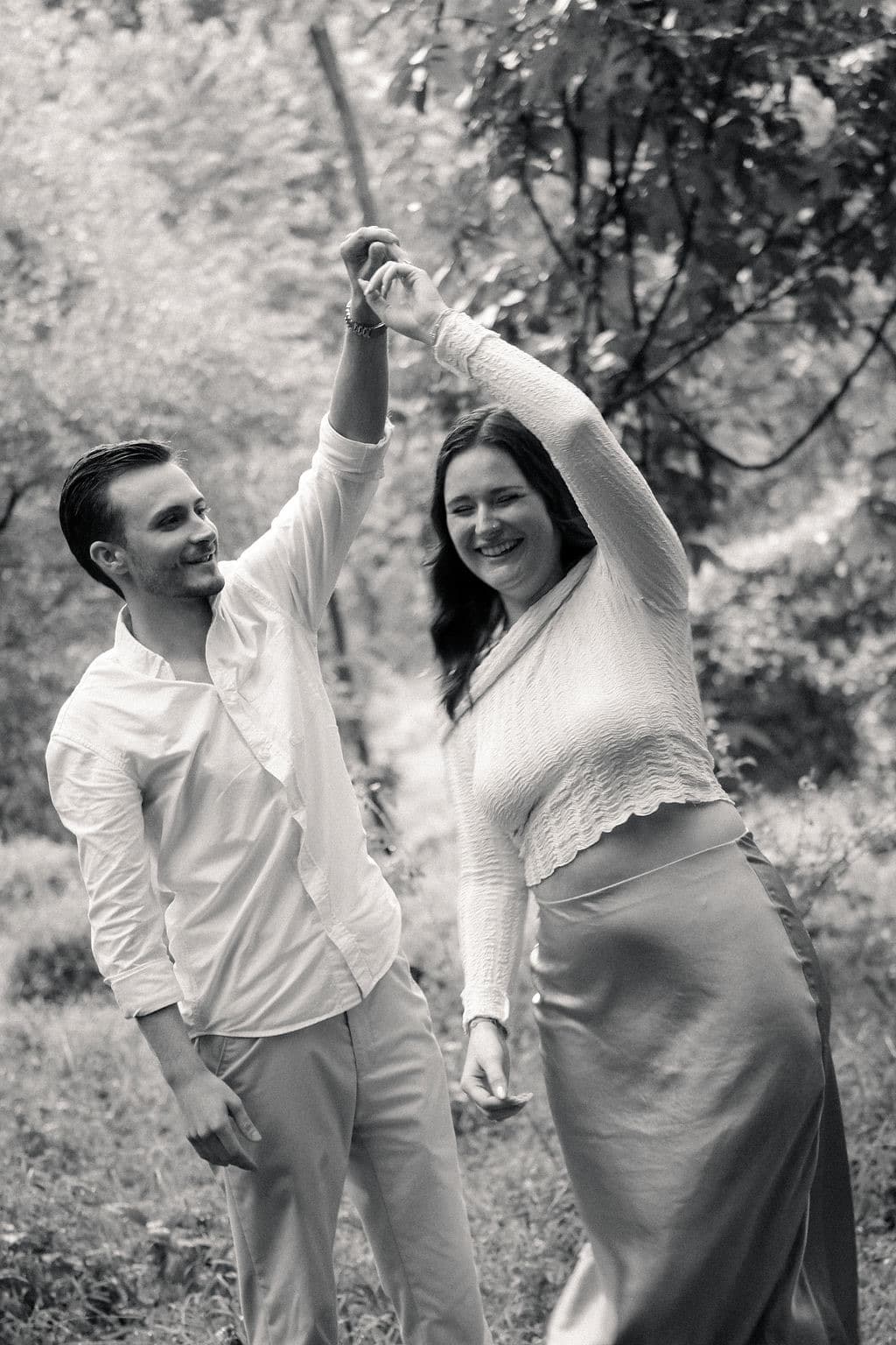 Black and white: Chandler twirling Caroline